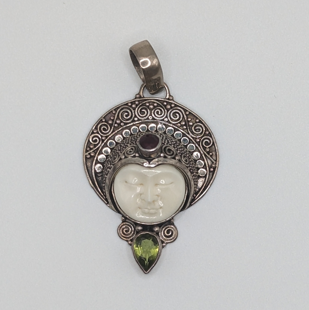 Peridot and Ruby Carved Bone Pendant